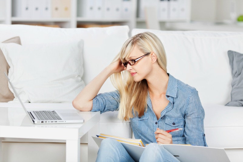 young woman working on laptop